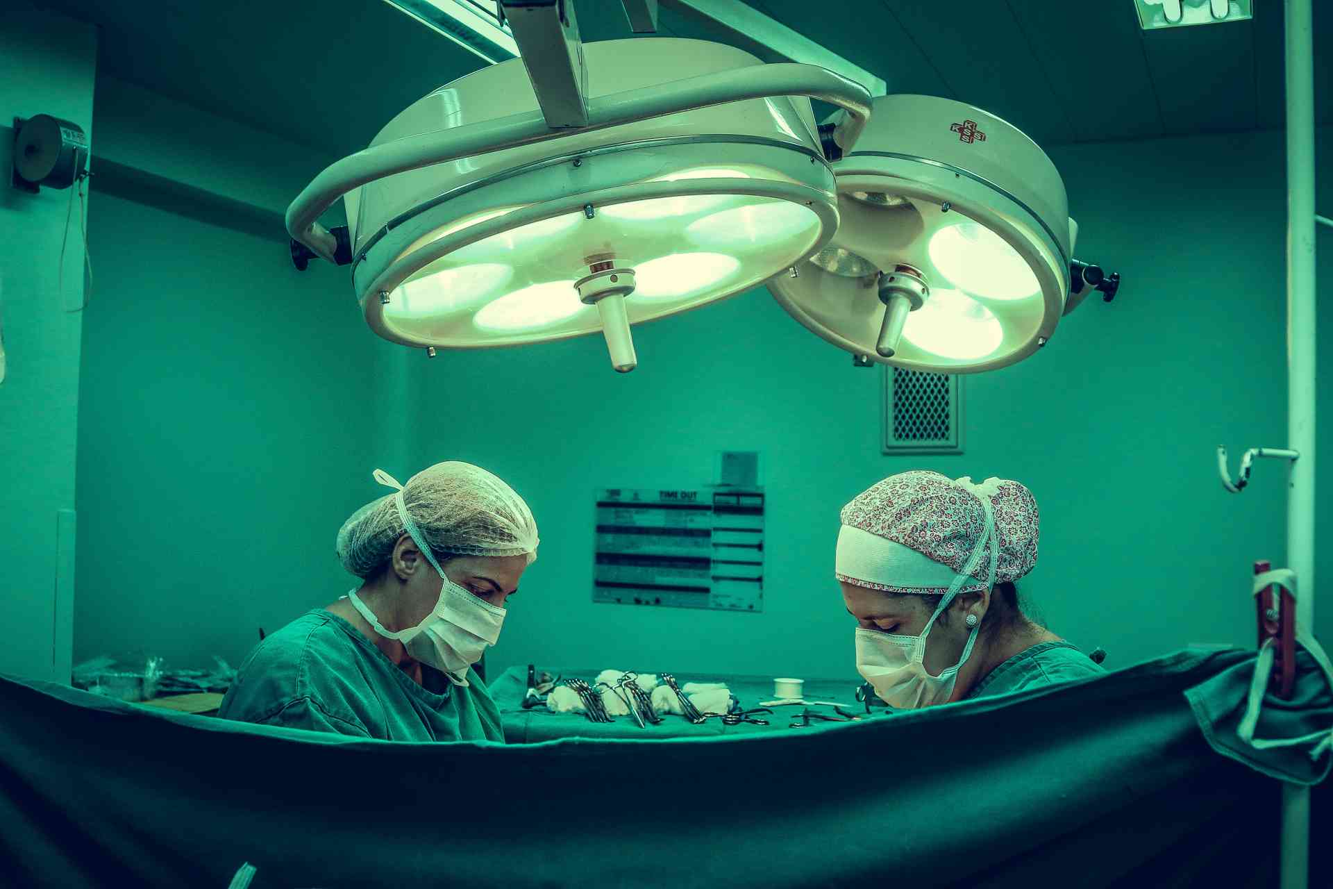 two-person-doing-surgery-inside-room-1250655